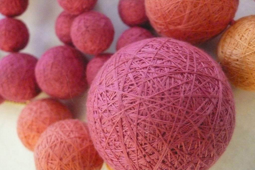 Hand-embroidered textile spheres, XUAN atelier