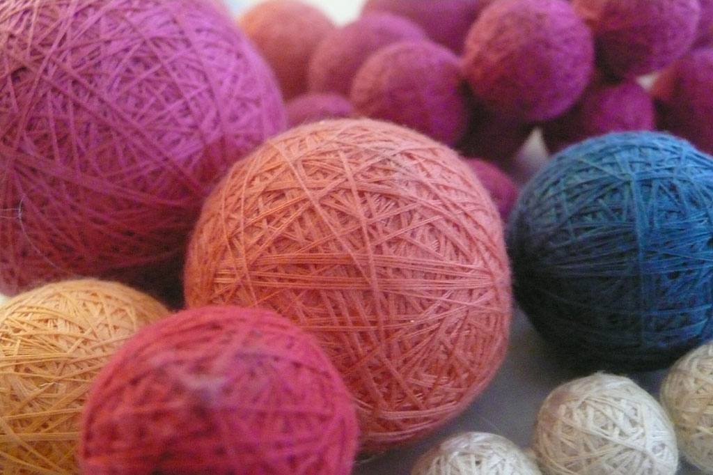 Hand-embroidered textile spheres, XUAN atelier